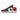 Der Nike Air Jordan 1 Low Bred Toe (GS) Sneaker in Standardgröße präsentiert ein auffälliges schwarz-weiß-rotes Design mit einem markanten schwarzen Swoosh-Logo an der Seite.