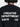 Sylt Sneaker: Schwarzer Strickpullover mit "Creative Department" und "CD 2018" Aufdruck auf dem Rücken. Gerippte Textur.